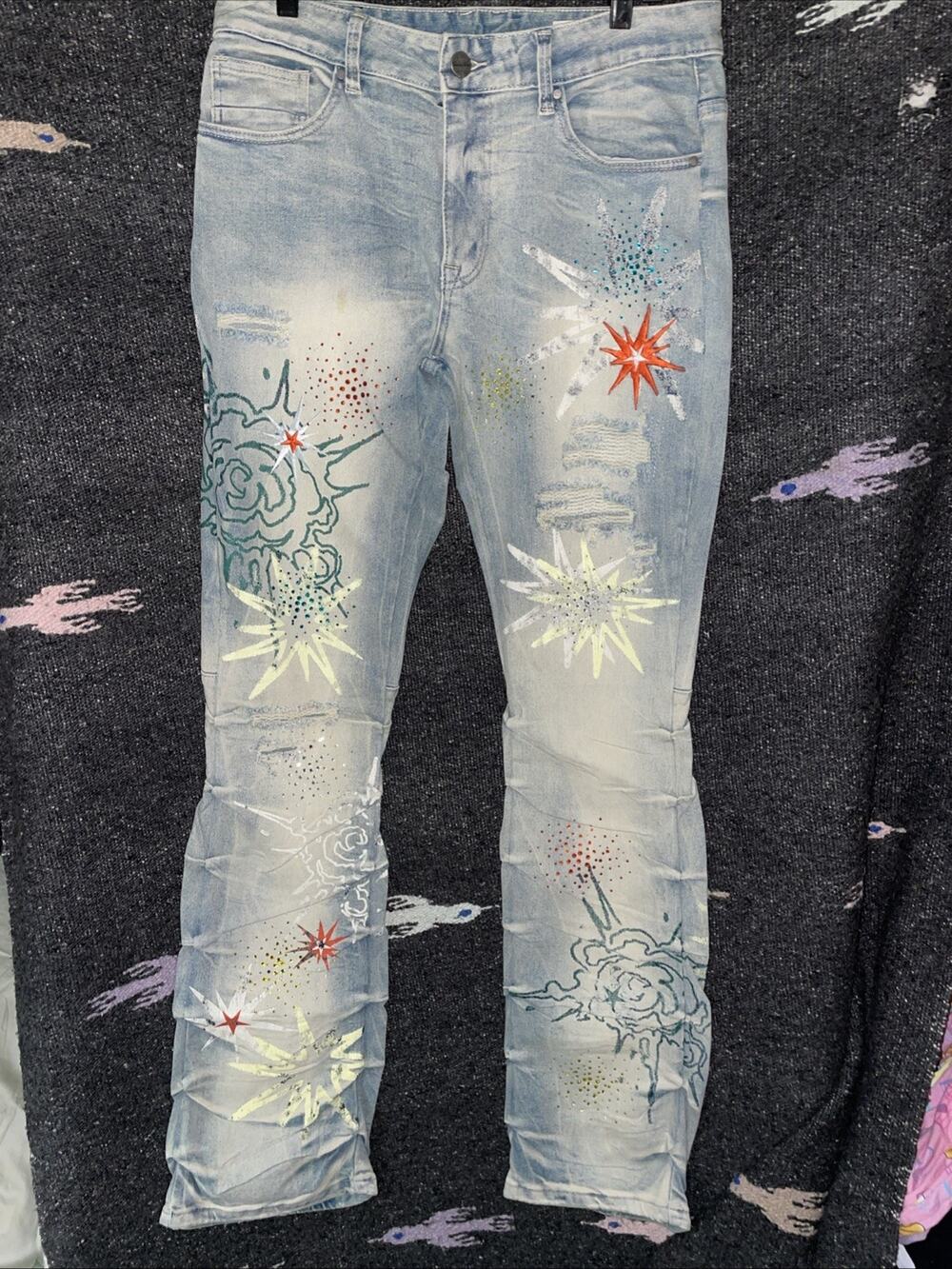 Smoke Rise Men's Distressed Stacked Denim Jeans with Rhinestone Star Graphics